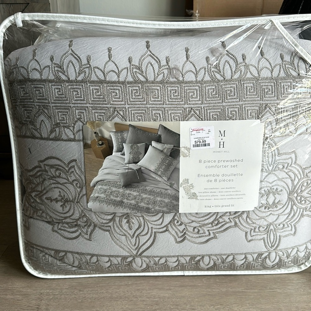 Brand new never opened eight piece king size Monet Hill, eight piece comf set